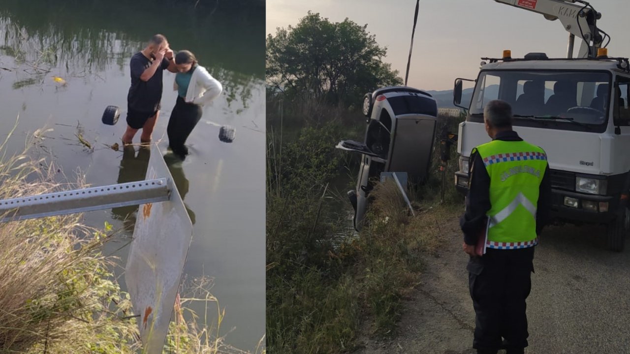 Muğla'da dereye düşen otomobilin üstüne çıkan 2 kişi kurtarıldı